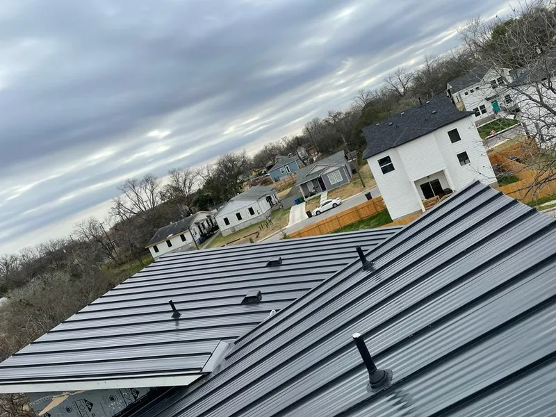 Standing seam metal roof panels with vents for Skylight Repair in Newton